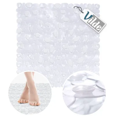 A transparent bath mat with a pebble-like texture, shown with a close-up of feet on the mat and a close-up of the suction cups.