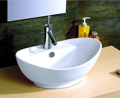 Immagine prodotto di Lavabo ovale in Vetroceramica MISSASSA 59x39x21 cm KARAG