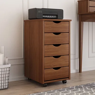 A wooden filing cabinet with five drawers sits next to a desk leg, with a printer on top.
