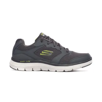 A side view of a gray Skechers sneaker with yellow accents, isolated on a white background.