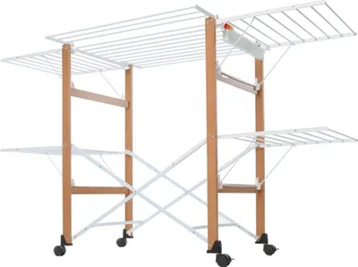 A multi-tiered clothes drying rack with wooden frame and white metal bars, on wheels.