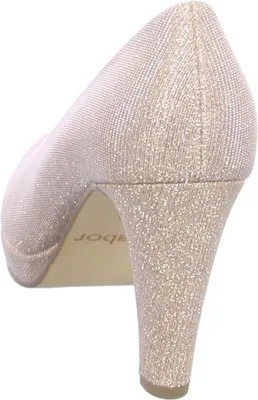 A side view of a glittery pink high-heeled shoe.