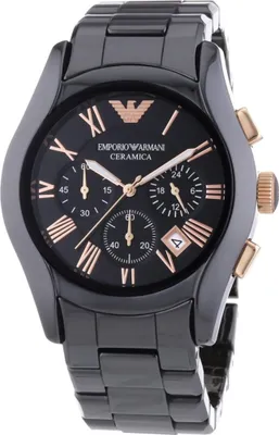 A close-up studio shot of a black Emporio Armani ceramic chronograph watch with rose gold accents.