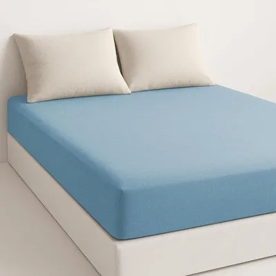Image de Drap-housse en microfibre bleu Unyqoos®, respirant et doux, pour matelas jusqu'à 28 cm de hauteur, avec coins élastiques
