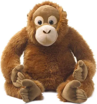 A plush orangutan toy is sitting on a white background.