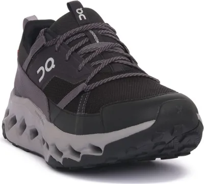 A studio shot of a single black and gray ON Running Cloudhorizon sneaker.