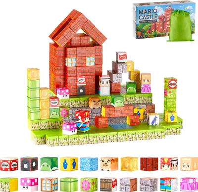A collection of magnetic building blocks arranged to form a castle-like structure, with additional blocks displayed in the foreground and a product box and bag in the background.