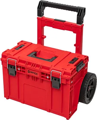 A red rolling tool cart with a black handle and wheels, shown against a white background.