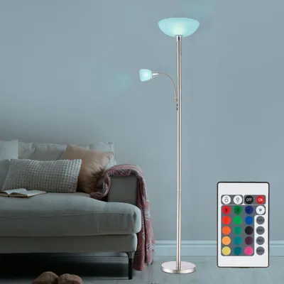 A modern living room with a sofa and a floor lamp.