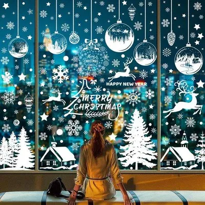 Immagine prodotto di Decorazione invernale per finestre con fiocchi di neve e Babbo Natale