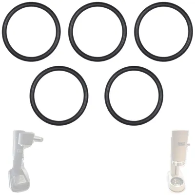 Five black O-rings are arranged in two rows at the top of the image. Below them, on the left, is a gray and white power tool. On the right, a white appliance with a clear base is shown.