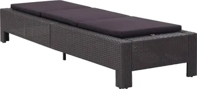 A dark brown rattan sun lounger with a black cushion, shown from a side angle against a white background.