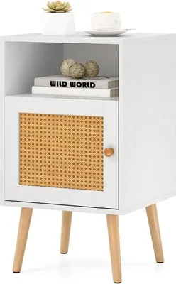A white wooden nightstand with a cane door and wooden legs, placed on a white background.