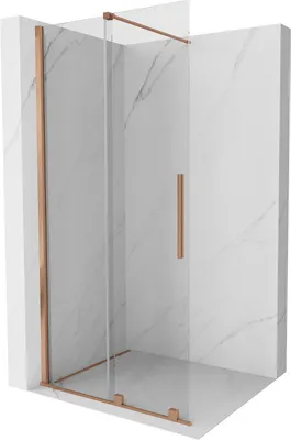 A modern shower enclosure with glass panels and copper-colored metal accents, set against a marble-patterned wall.