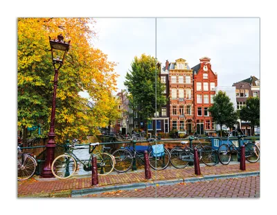 Produktbild von Wallario Herdabdeckplatte aus Glas, Größe 70 x 52 cm 2-teilig, Motiv Herbst in Amsterdam