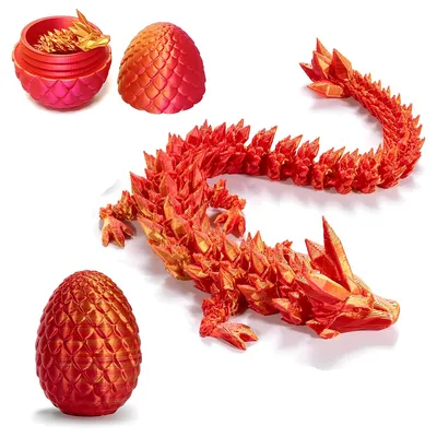 A 3D printed dragon and its egg are displayed on a white background.