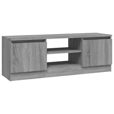 A studio shot of a gray TV stand with two doors and open shelving.