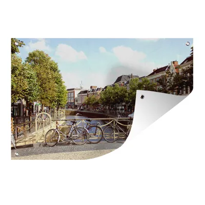 Obrázok produktu pre MuchoWow® Vonkajší plagát - Záhradná dekorácia ochrana súkromia - Záhradné plagáty pre záhradu - Leeuwarden - most - bicykel - 120x180x0.2cm