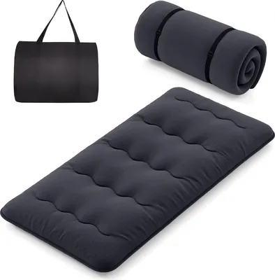 A dark gray Japanese futon mattress, a rolled-up mattress with straps, and a black carrying bag are displayed against a white background.
