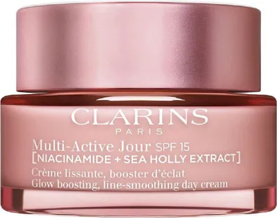 A close-up studio shot of a Clarins Multi-Active Jour SPF 15 day cream jar.