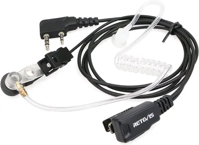 A close-up product shot of a two-pin security earpiece with a coiled acoustic tube.