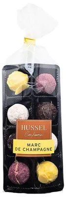 Produktbild von Hussel Pralinenblister Marc de Champagne, 100g