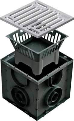 An exploded view of a drainage system component, showing the grate, filter basket, and base unit.