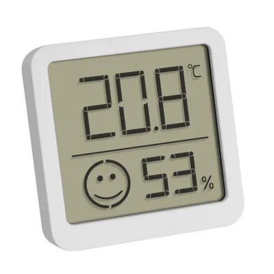 A digital thermo-hygrometer displaying temperature and humidity.