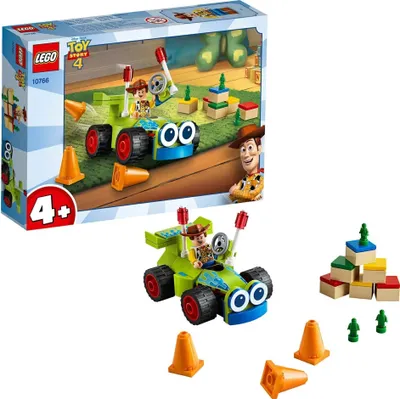 A LEGO set box and assembled toy car with accessories.