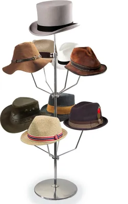 A chrome hat stand displaying nine different hats.
