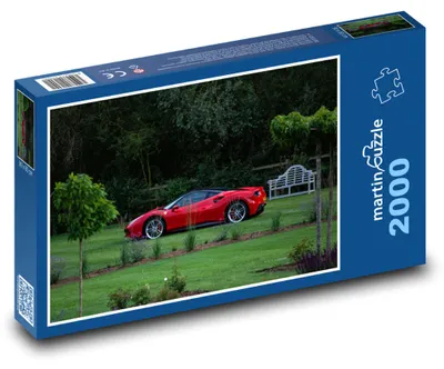 Zdjęcie produktu dla Puzzle 2000 Czerwony sportowy samochód w ogrodzie - martinpuzzle