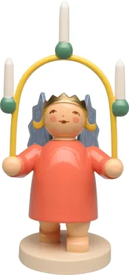 A wooden angel figurine with a crown and wings, holding a candelabra with three candles. The figurine is standing on a circular base.