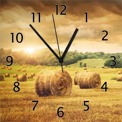 Produktbild von Wallario Design Wanduhr Strohballen auf dem Feld bei Sonnenuntergang aus Echtglas, Größe 30 x 30 cm