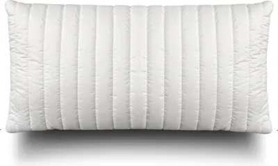 A white quilted pillow on a white background.
