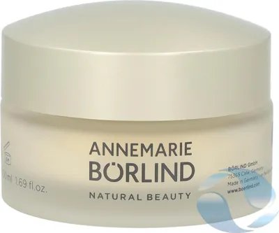A close-up studio shot of a cream-colored jar of Annemarie Börlind Natural Beauty skincare product.