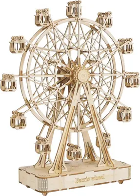 A wooden model of a Ferris wheel on a white background.