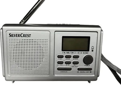 A silver Silvercrest radio with an extended antenna, shown against a white background.
