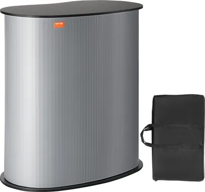 A portable trade show counter and its carrying bag are displayed against a white background.