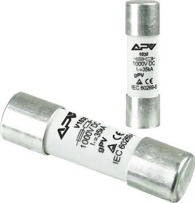 Two cylindrical fuses are shown against a white background. One fuse is lying horizontally in the foreground, and another is standing vertically in the background.