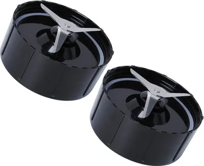 Two blender blade attachments for a Magic Bullet Mini.