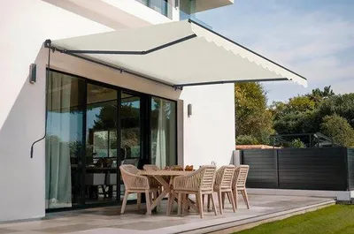 Imagen del producto de Sombrilla manual color beige, de 4 metros por 3 metros, con protección UV50+ para jardín y terraza