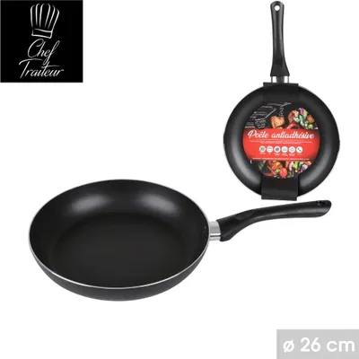 A black frying pan with a black handle is shown, with a smaller image of the same pan in the background. A logo and text are visible on the packaging of the background pan.