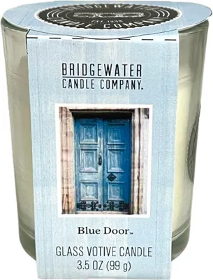 Imagen del producto de Vela votiva con aroma, en un frasco de la marca Blue Door