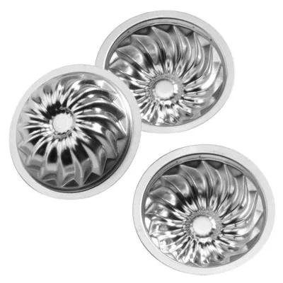 Three silver bundt cake molds are arranged on a white background.