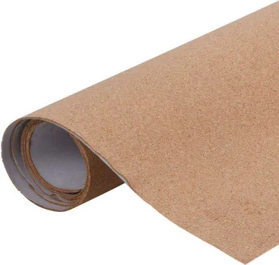 A roll of cork material, partially unrolled.