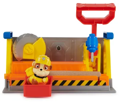 Produktbild von Rubble & Crew - Werkstatt Spielset mit 2 Werkzeug-Aufsätzen, 1 Rubble Hundefigur, 85g Kinetic Sand Build-it Sand und 1 Sandform, Bau, 3 Jahr(e), Mehrfarbig