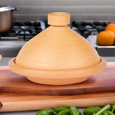 Produktbild von Tajine Tuareg mit orientalischem Design, handgefertigt, in Terracotta 31 cm