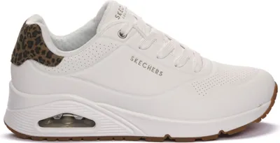 A side view of a white Skechers sneaker with leopard print detailing on the heel.