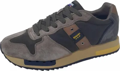 Produktbild von Grüner Herrensportschuh mit Kontrastdetails und herausnehmbarem Fußbett.
