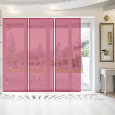 A room with large glass doors leading to a garden, covered by pink sliding panels.